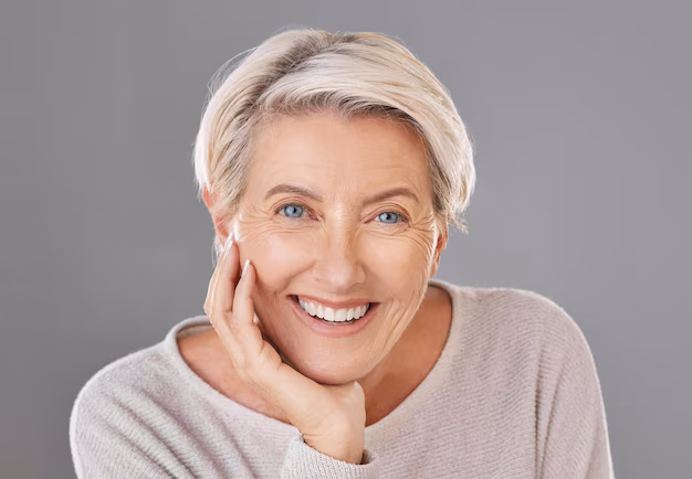 skincare-beauty-happy-senior-woman-face-model-with-healthy-teeth-giving-smile-headshot-studio-portrait-dental-wellness-cosmetic-surgery-elderly-women-stay-beautiful_590464-79599.avif